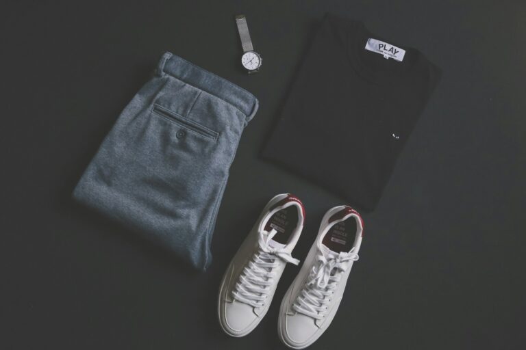 Flatlay office clothes blazer trousers loafers