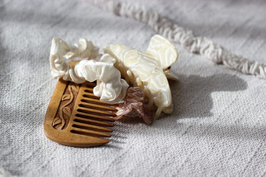 Woman using claw clip hair accessory