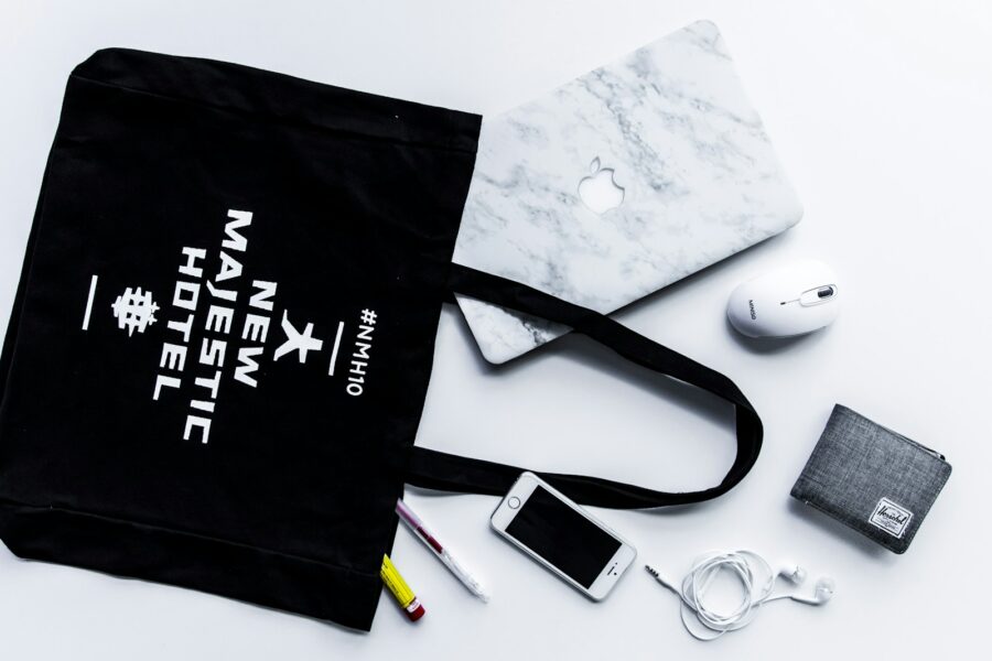 Organized tote bag pouches wallet keys phone