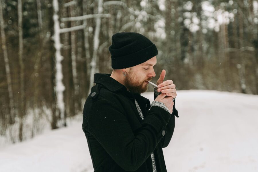 Man winter skincare applying moisturizer