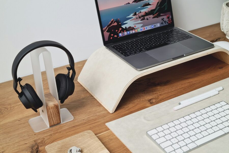 Home office desk laptop stand lamp headphones