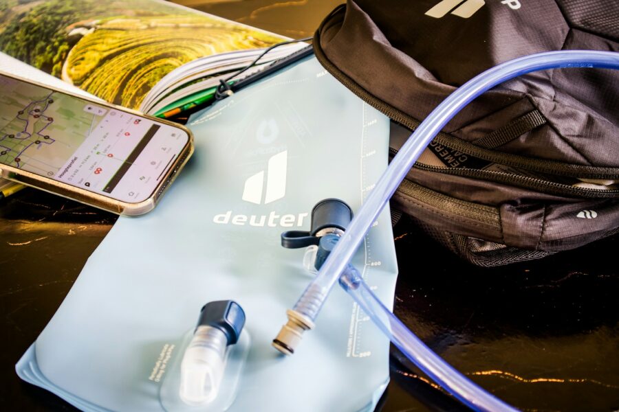 Commuter backpack contents phone water bottle notebook