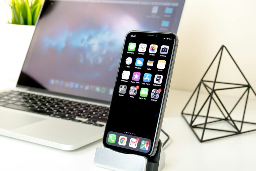 Everyday tech gadgets desk phone charger key tracker