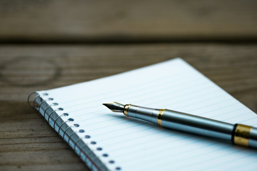 Budget shopping list notebook pen
