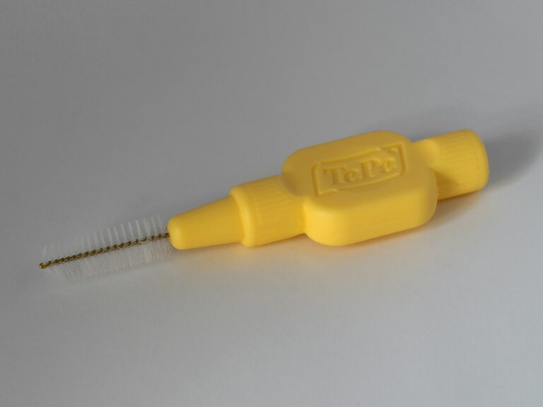 Interdental brushes dental floss flat lay