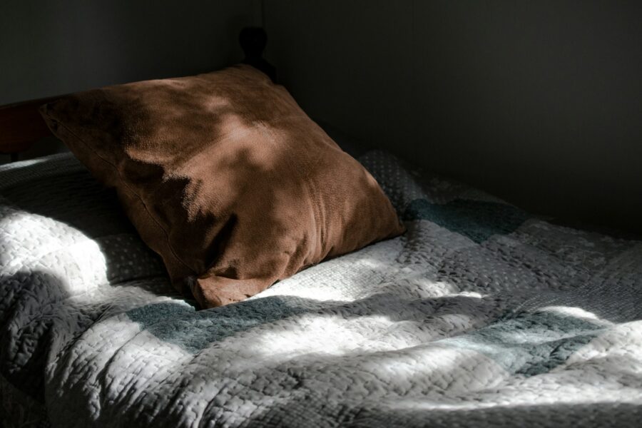 Cozy bedroom bed linen pillows soft light