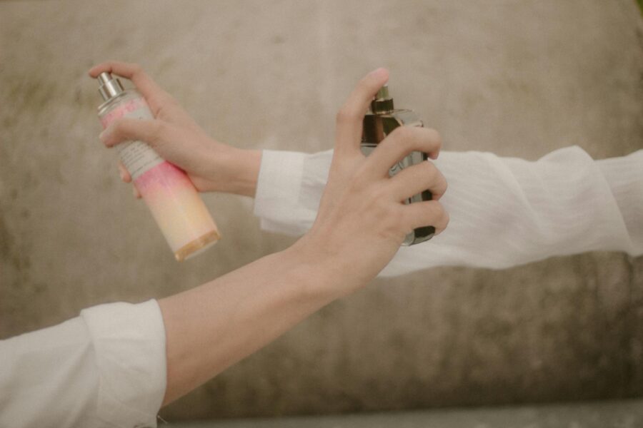 Perfume bottles hands