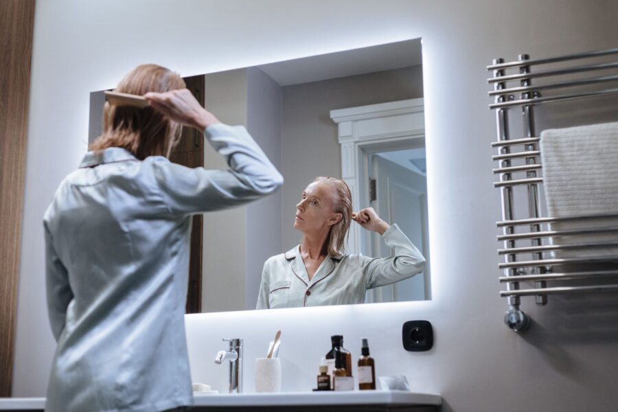 Woman brushing hair