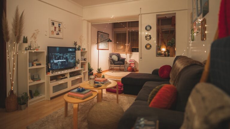 Cozy autumn living room blankets cushions warm lighting