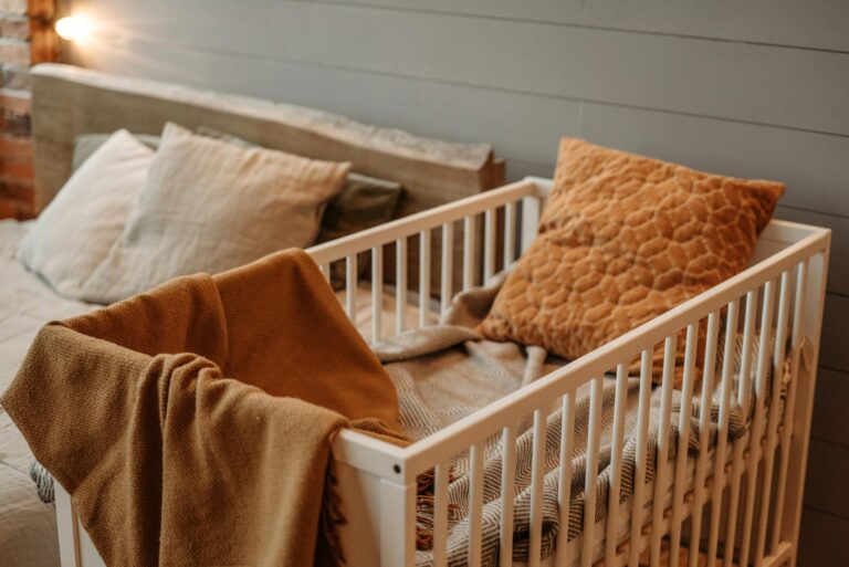 Cozy autumn bedroom warm lighting blankets pillows