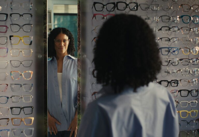 Woman trying sunglasses
