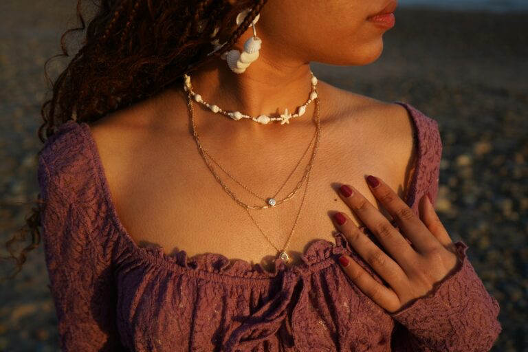 Woman layered necklaces