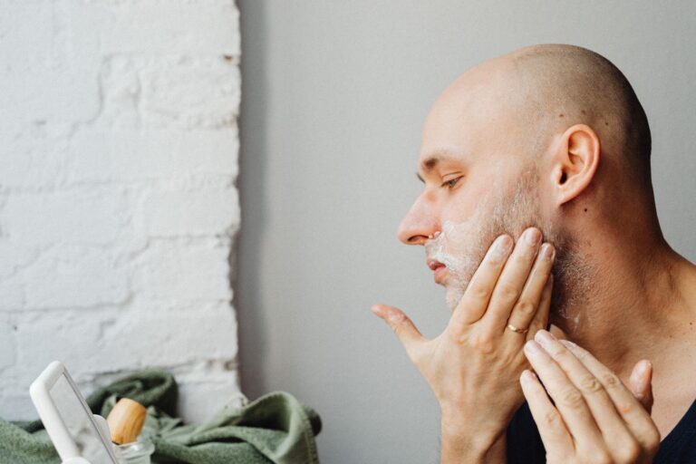 Man trimming beard