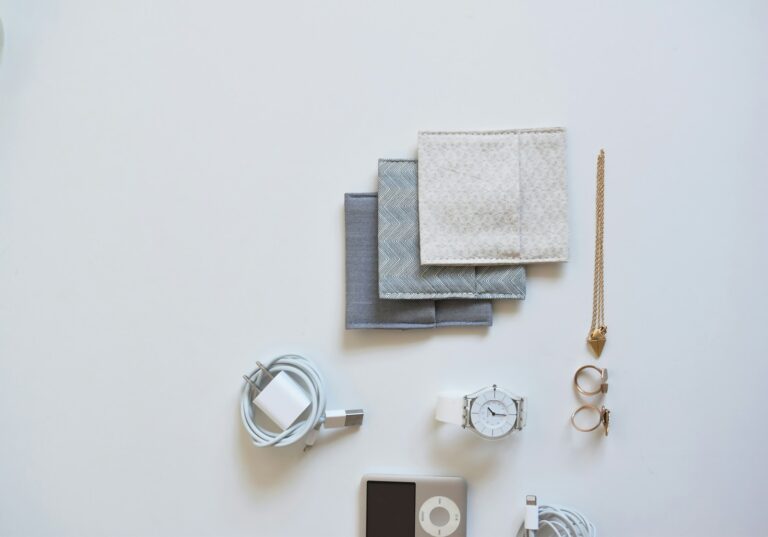 Flat lay simple neutral clothes accessories