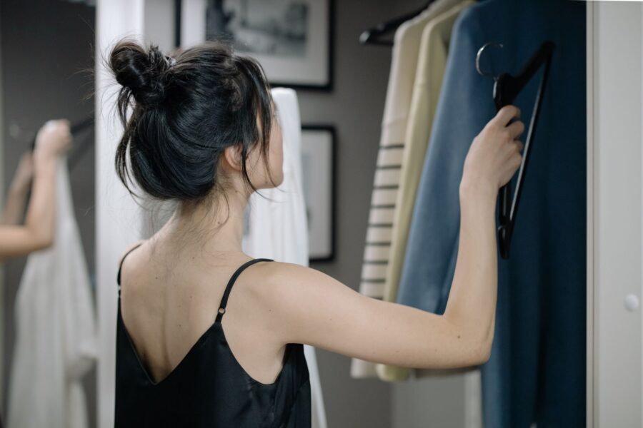 Woman sorting clothes
