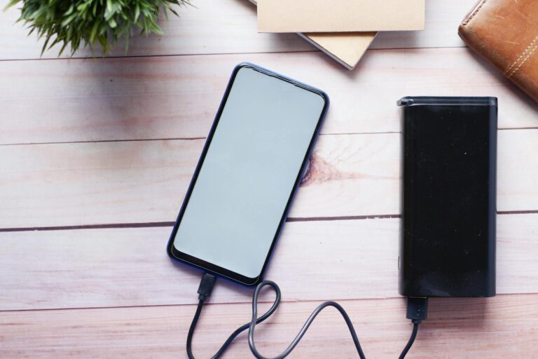 Smart power strip wooden desk cables