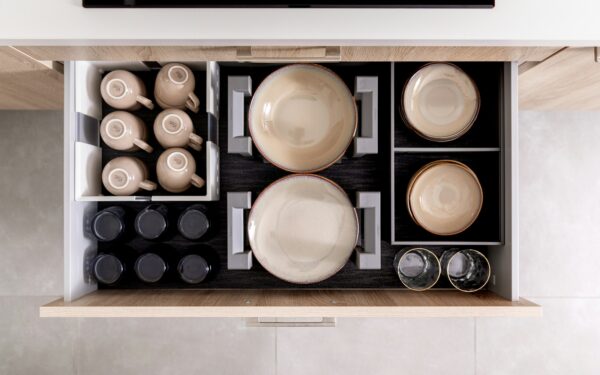 Drawer dividers and inserts that keep everyday essentials in easy reach