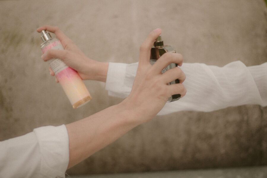 Perfume bottles hands