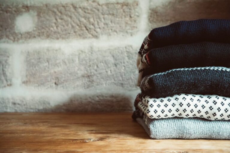 Folded neutral sweaters